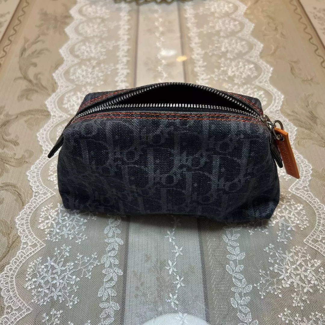 Pochette en jean Christian Dior Trotter CM1106 18 cm x 10 cm utilisée en douceur