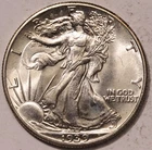 1939-P Walking Liberty 50c Gem Unc. Very strong strike (see thumb!) Nice luster.