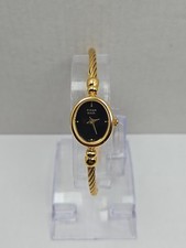 Titan Raga Womens Gold Tone Bangle Bracelet Watch Black Dial Dainty New Battery