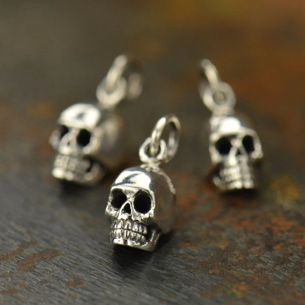 Sterling silver skull best sale charm