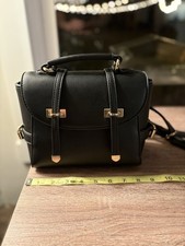 Versatile Black Handbag With Shoulder Straps That Can Be Worn As Backpack