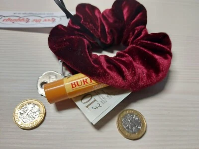 Stash Scrunchies. Hair scrunchies with hidden zip storage.