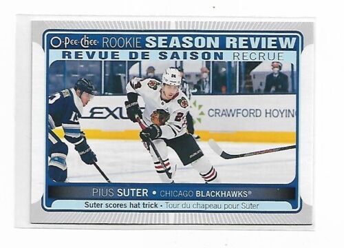 NHL - 2021-22 OPC Rookie Season Review - Pius Suter - Chicago Blackhawks #542 - Bild 1 von 1
