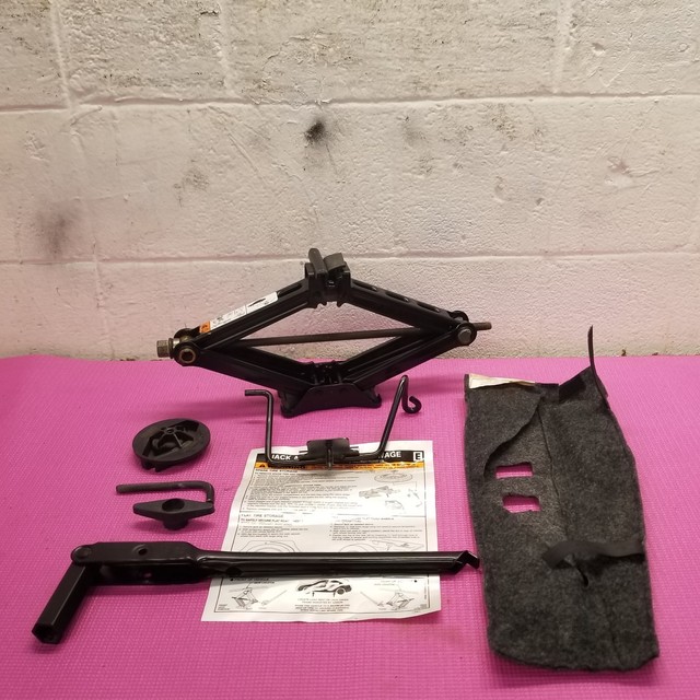 05 06 07/06 FORD FREESTYLE SPARE TIRE JACK KIT WITH HOLD DOWNS. eBay