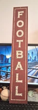 BURGUNDY FOOTBALL METAL SIGN, 27" x 4.5" VERTICAL, MANCAVE