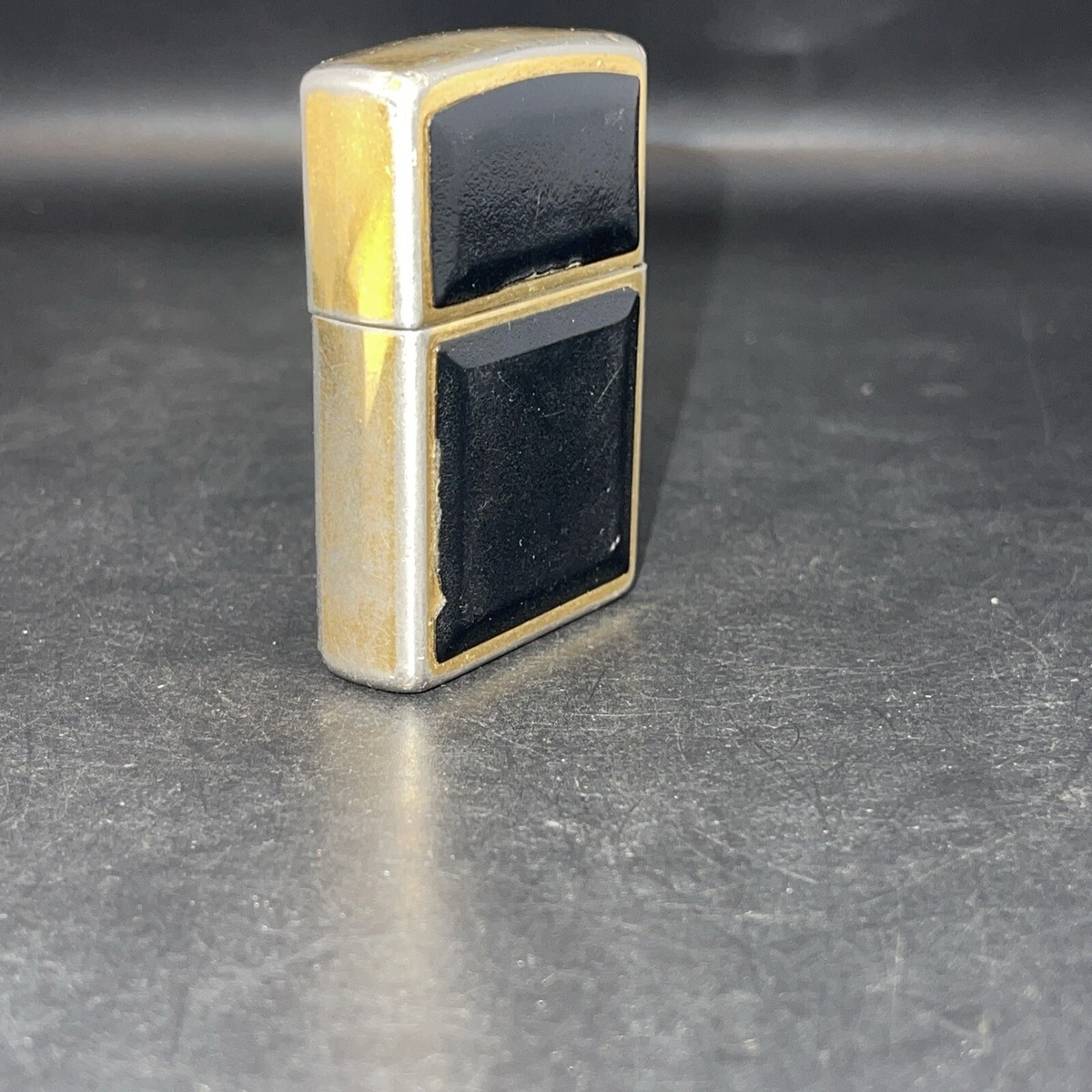 VTG 1994 D X Zippo Gold Brass Black Plastic - UNENGRAVED HAS WEAR
