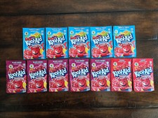12 EXPIRED Packets of Kool-Aid: 5 Tropical Punch, 5 Black Cherry, 2 Cherry