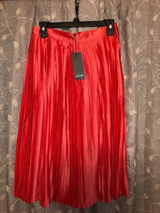 saia plissada coral