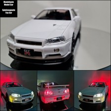 Modellauto 1:18 - Nissan Skyline GTr R34 - mit Licht- & Soundfunktion - weiß