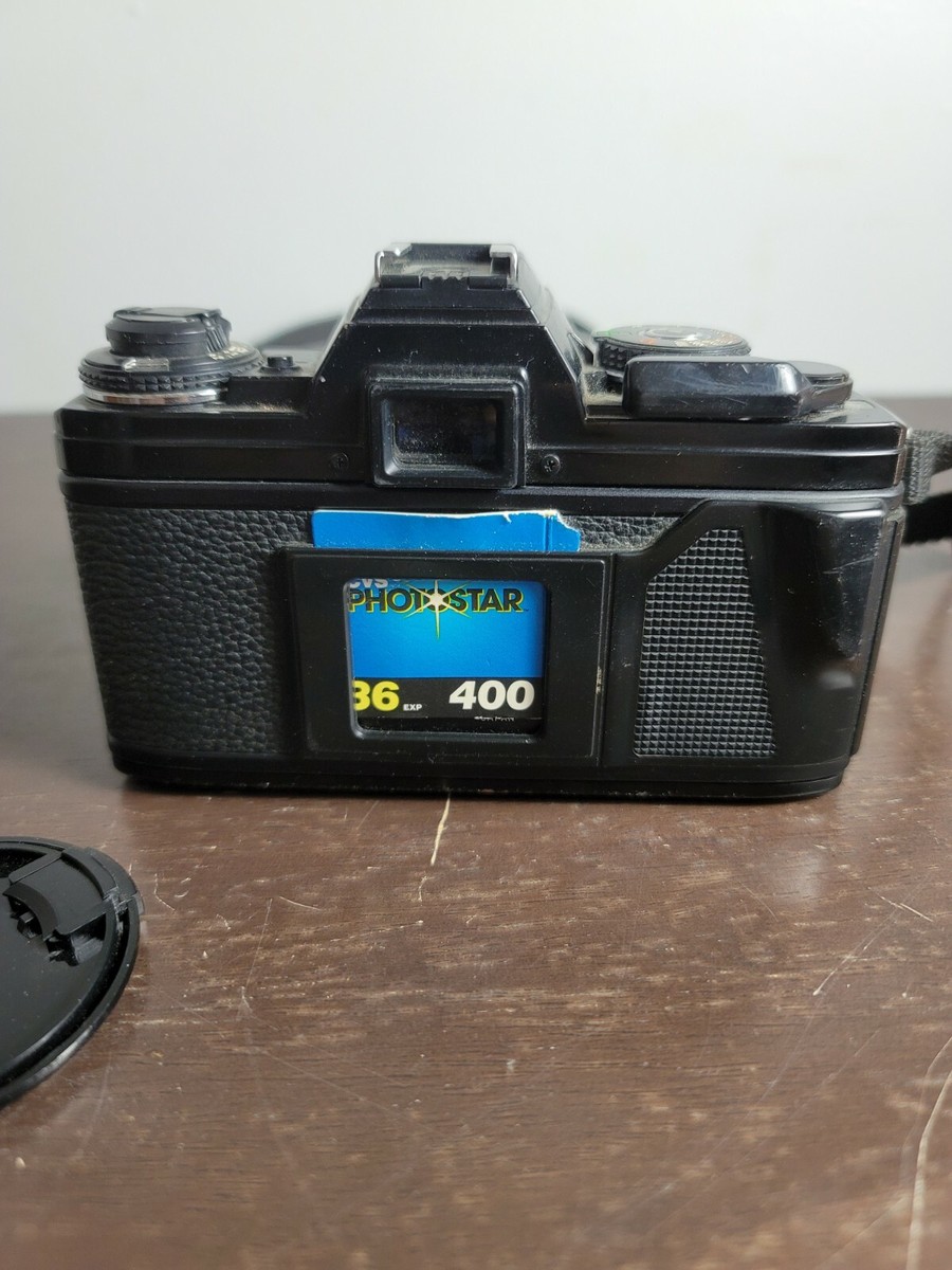 Minolta X-700 SLR Film Camera 1:2.8 Starblitz 135mm lense w