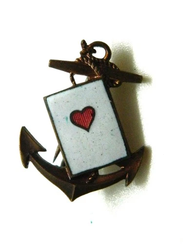 small insignia depicting a navy anchor with an ace of heart early 1900