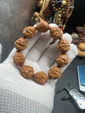 China Olive Hand Carved Mountain Ghost Buddhas橄榄核手工双面雕刻山鬼恶憎手串