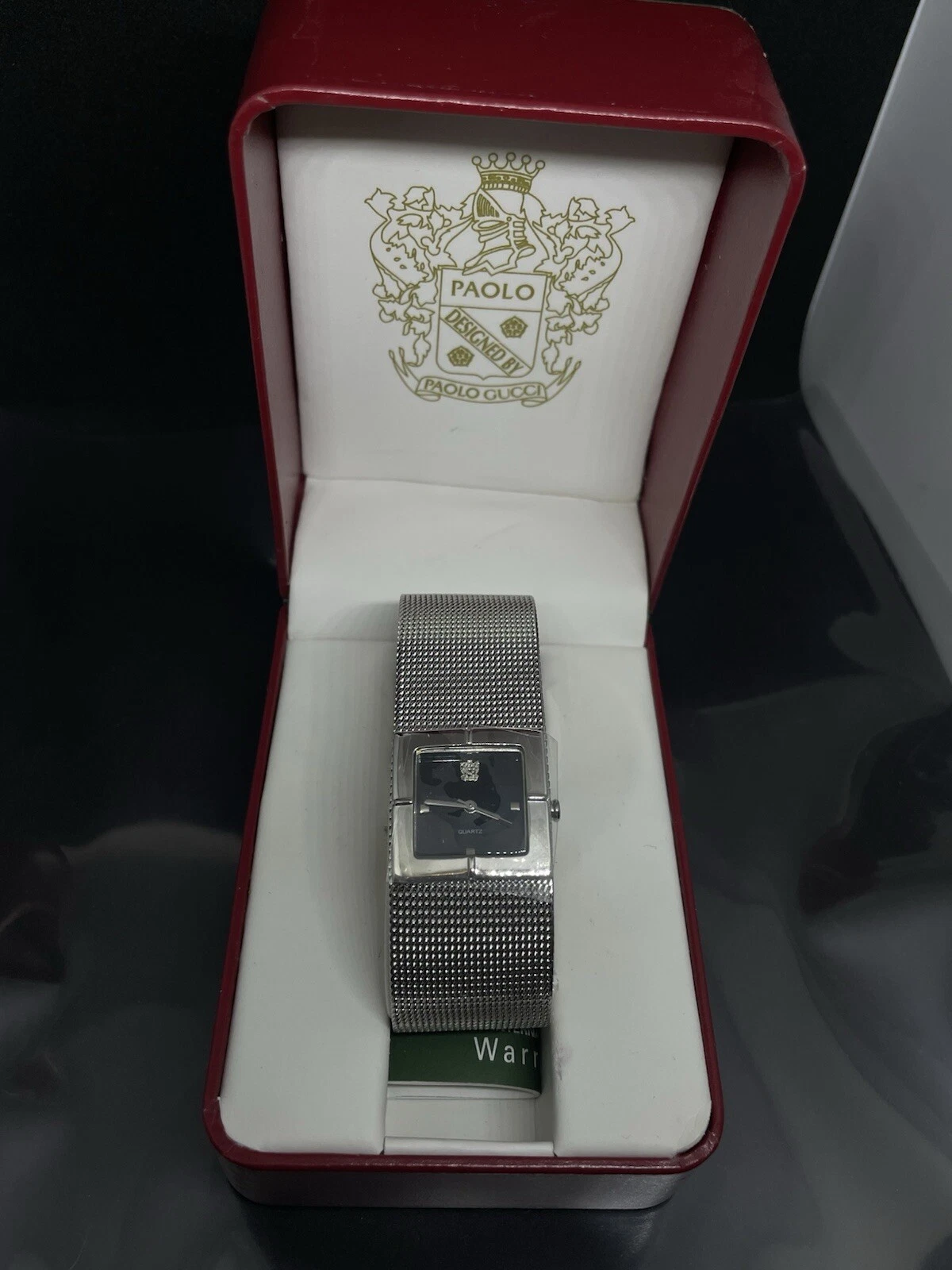Montre bracelet réglable vintage femme Paolo Gucci maille argentée neuve dans sa boîte LIRE
