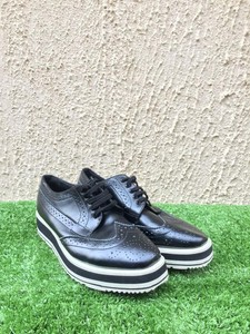 prada wingtip leather platform brogues