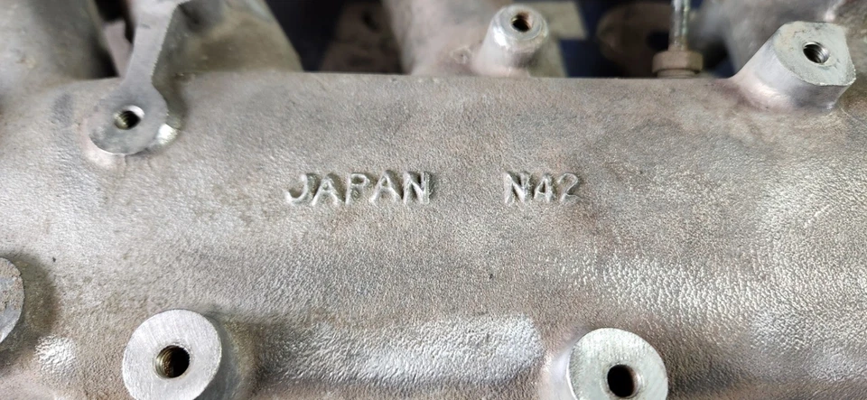 Colector de admisión Datsun 75-76 280z OEM N42 sin EGR Foto 2 de 4