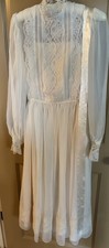 1980's Vintage ivory wedding dress. Beautiful gently worn tea length dress.