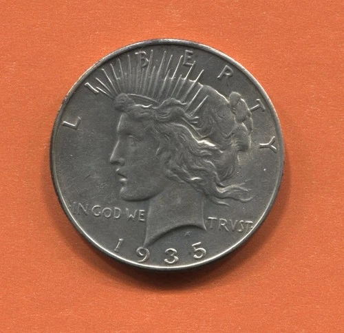1935 Peace Dollar AU but has edge ding (90% Silver)