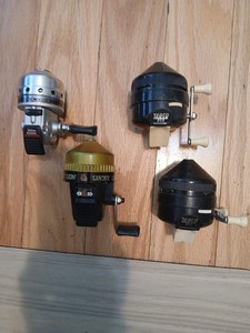 Vintage Spincast Fishing Reels -2 Zebco 202, South Bend Lucky Lion, Daiwa RS80RL