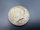 1964 Kennedy Half Dollar, 90% Silver, Uncirculated, Nice Toning, As Shown.