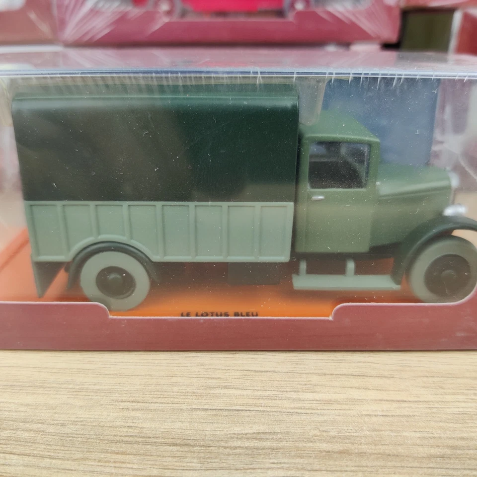 AUTO TINTIN IL CAMION DELL'OPPIO DEL LOTO BLU 1:43 NUOVA BTE ARANCIONE #25 - Immagine 2 di 4