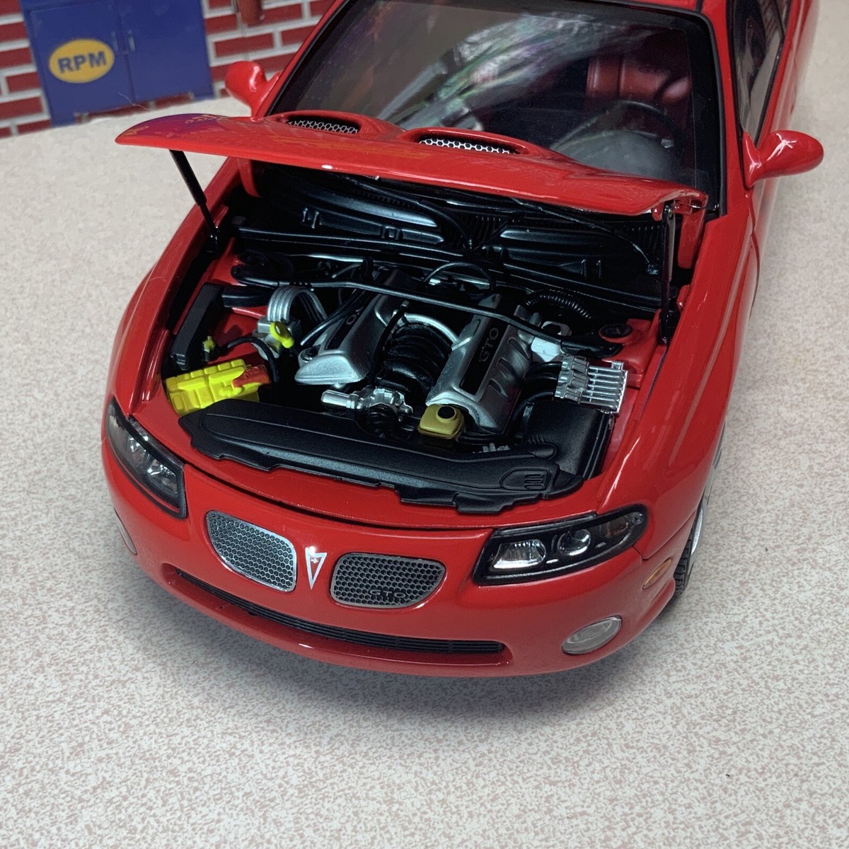 Pontiac GTO 2006 – Miniature GMP 1/18 – Métal Monté – Boîte D'origine (neuf)