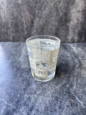 Shot glass White graphics Paris Holland Africa Venice Britain Mexico Travel.