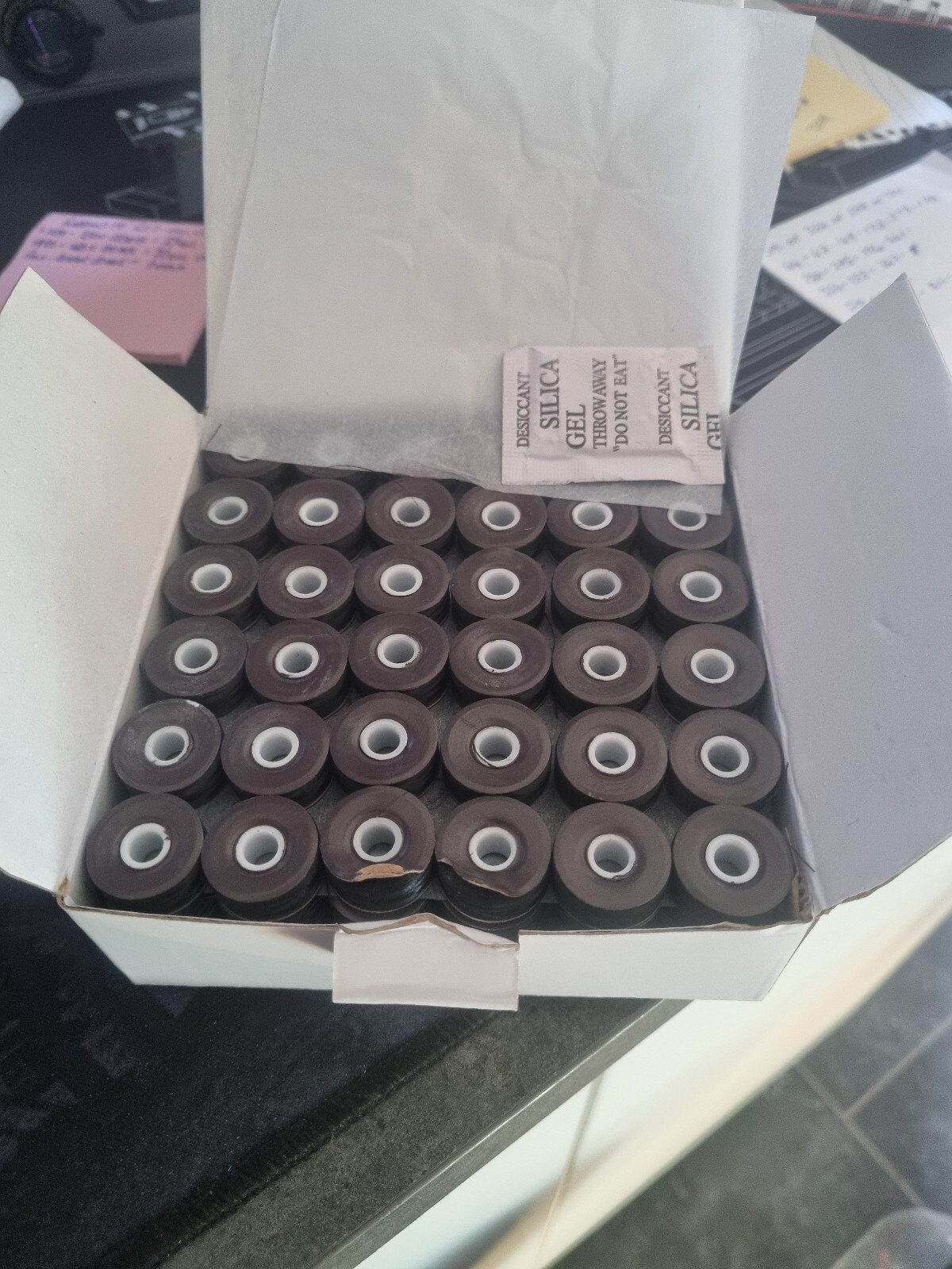 card side pre wound bobbins for embroidery and sewing machines