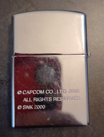 Capcom vs SNK Millennium Fight 2000 Ken Silver Lighter w/ Dreamcast fan disc
