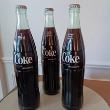 1980's Vintage  "Un-Opened" 16oz. Glass Bottle Coca Cola's /Money Back Bottles