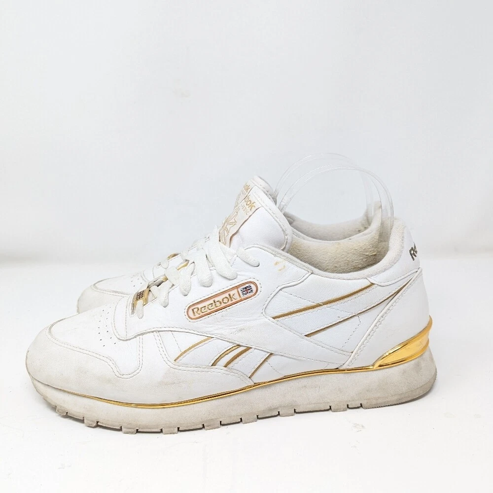 White and gold reebok hotsell classics