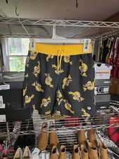 These are the Neff Boys Fired Up Ducky Graphic Swim Shorts in black Size M8