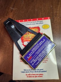 nes game genie with book broken tab