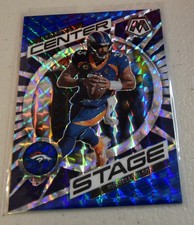 2023 Panini Mosaic Center Stage Blue Mosaic Prizm /99 Russell Wilson #CS-RW
