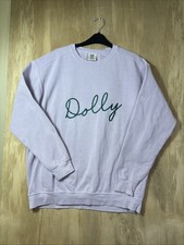 Dolly Purple Sweatshirt Size Large With Green Writing.