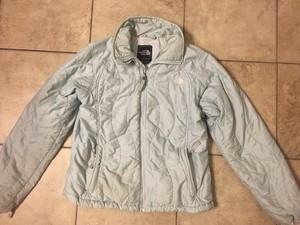 light blue north face puffer