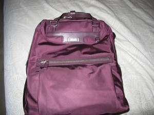 tumi purple backpack