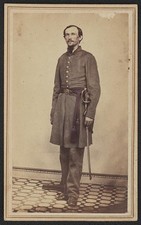 Unidentified soldier in Confederate uniform with sword / E.S. Lumpkin Co