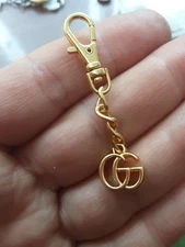 Gucci Keychain  gold logo gg small