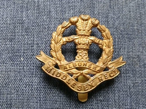 #103 – THE MIDDLESEX REGIMENT WW1 BRASS ECONOMY CAP BADGE