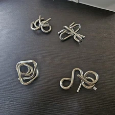  Mind Teaser Puzzle Set 2007 Target 4 Different Puzzle Plus Instructions 