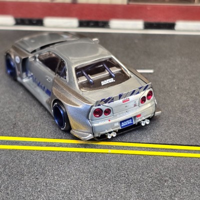 CHASE] KAIDO HOUSE MINI GT NISSAN SKYLINE GT-R (R34) SHINJUKU V1