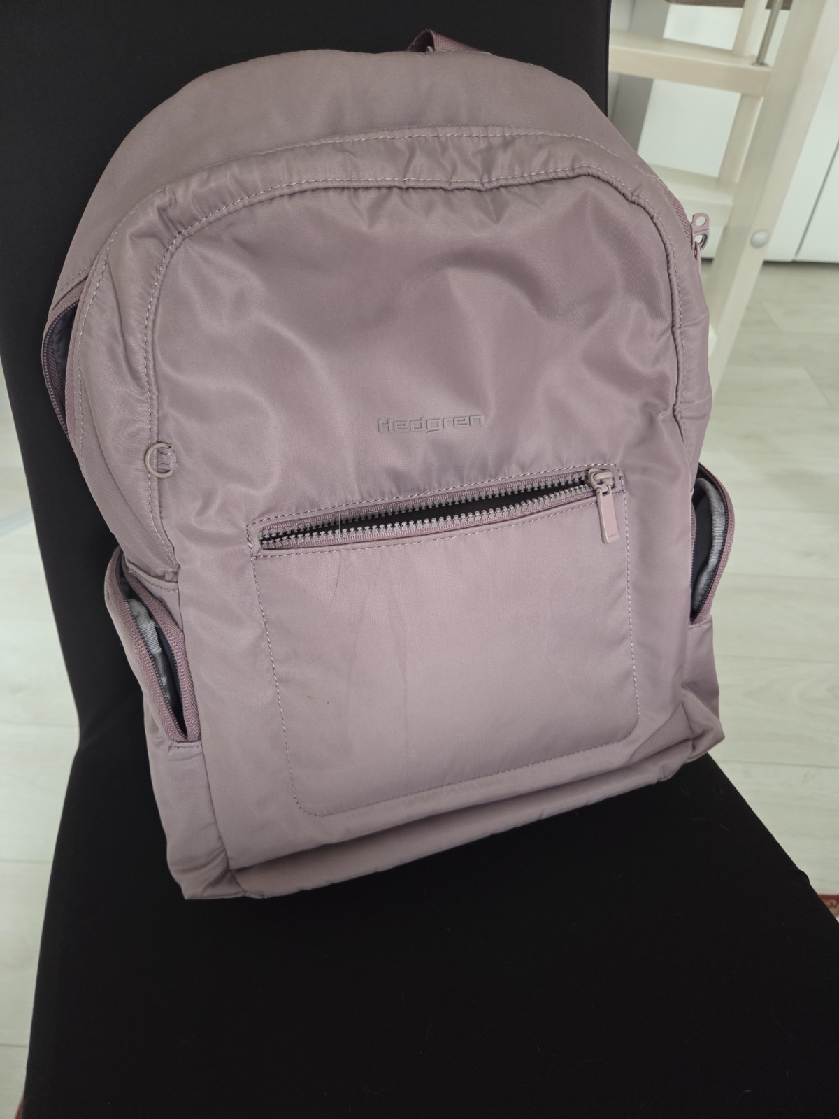 Mochila de viaje Hedgren Backpack lila características de seguridad