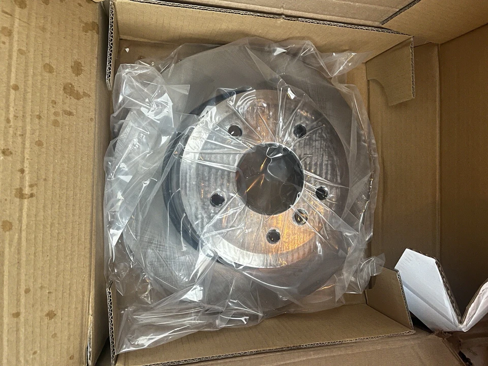 Kit de pastillas de freno y rotor BMW 528xi Foto 3 de 4