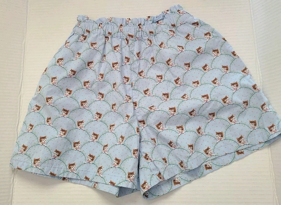 优衣库 Paul & Joe 短裤女孩 7/8 蓝色猫印花纸袋口袋 — 第 2/4 张图片