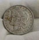 1886 O US Morgan Dollar $1 VF (Tape Residue)