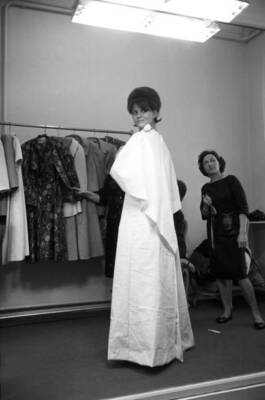 Claudia Cardinale trying on a dress at Nina Ricci's fashion house - Old Photo 2
