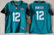 Tariffs​ Free~ YOUTH'S Travis Hunter #12 Jaguars FUSE Teal Sewn Stitched Jersey.