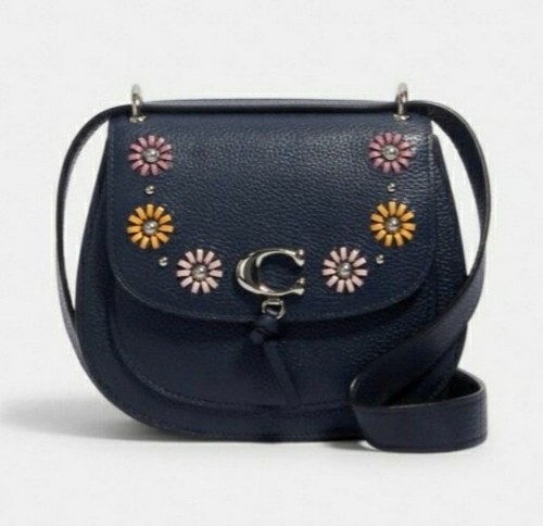 remi saddle bag with whipstitch daisy applique