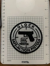 GLOCK FIREARMS SAFE ACTION PISTIOLS -SILVER MYLAR PATCH - NEW
