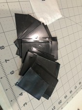 Over 30 Showgard used small strips Stamp mounts black roughly 40mm x 80 LOT 9